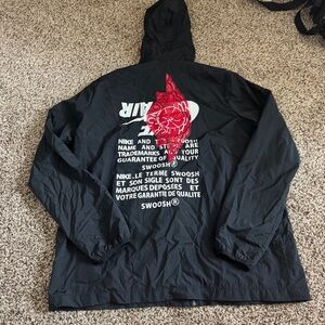 Jordan Black Windbreaker with Red and White Graphics